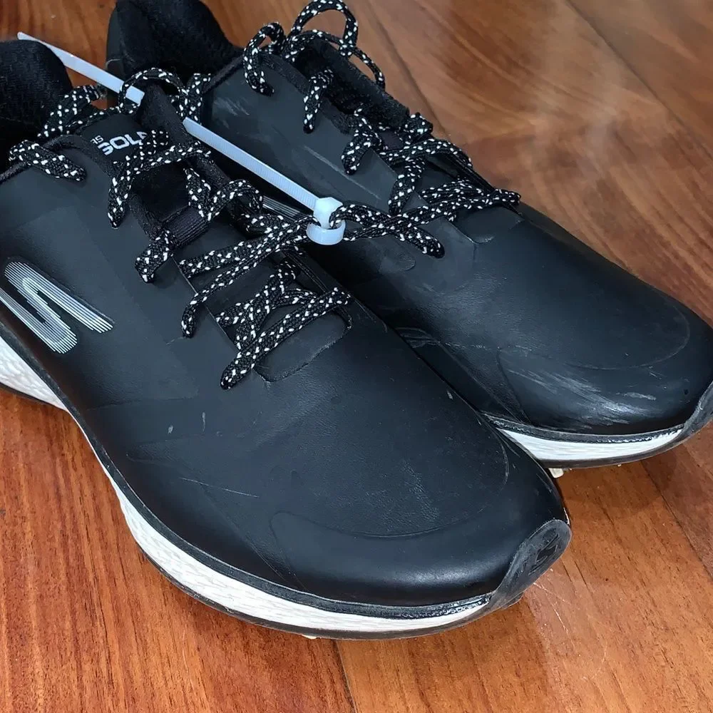 Skechers women’s Black Athletic Golf cleats Sneakers with White Accents size 7.5